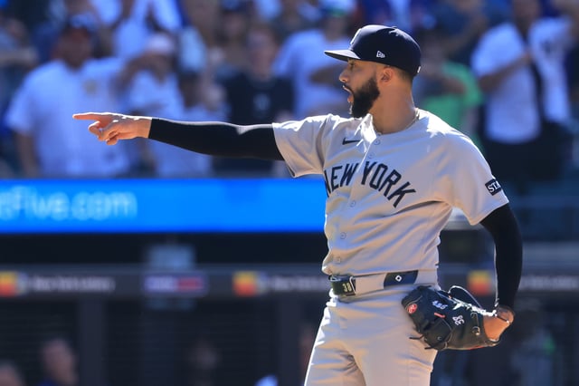 NEW YORK, NEW YORK - JULY 06: Devin Williams #38 of the New York Yankees reacts after a pitch against the New York Mets at Citi Field on July 06, 2025 in New York City.