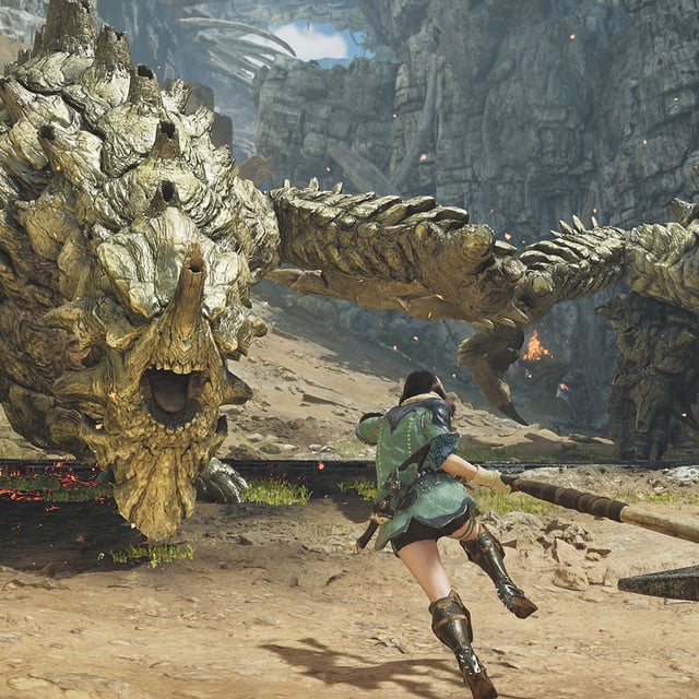 Promotional screenshot of a player hunting Gravios with a pick-axe.