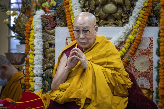 FILE - Tibetan spiritual leader the Dalai Lama presides over an event during which Tibetan exiles prayed for his longevity, a day before his 90th birthday, in Dharamshala, India, Saturday, July 5, 2025.(AP Photo/Ashwini Bhatia, file)