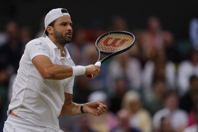 Tennis - Wimbledon - All England Lawn Tennis and Croquet Club, London, Britain - July 7, 2025 Bulgaria's Grigor Dimitrov in action during his round of 16 match against Italy's Jannik Sinner REUTERS/Andrew Couldridge/File Photo