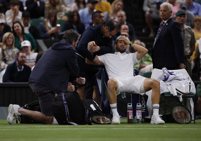 Tennis - Wimbledon - All England Lawn Tennis and Croquet Club, London, Britain - July 7, 2025 Bulgaria's Grigor Dimitrov reacts as he receives medical attention after sustaining an injury during his round of 16 match against Italy's Jannik Sinner REUTERS/Andrew Couldridge/File Photo