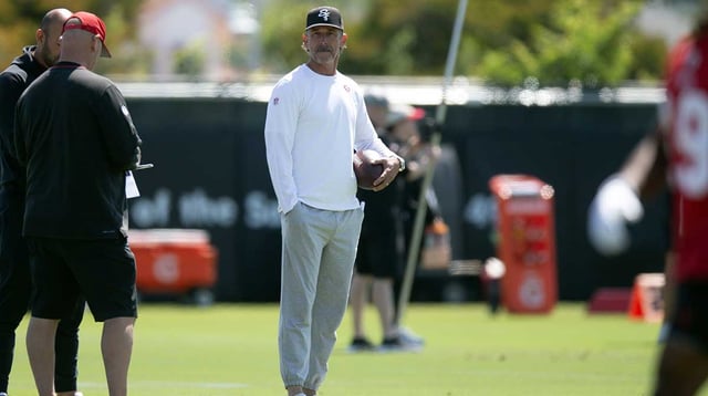 Jun 10, 2025; Santa Clara, CA, USA; San Francisco 49ers head coach Kyle Shanahan watches his players work out during an OTA at Levi&#39;s Stadium. Mandatory Credit: D. Ross Cameron-Imagn Images