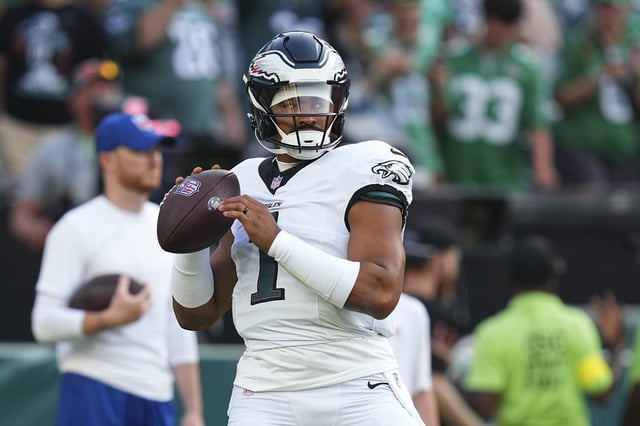 Jalen Hurts #1 of the Philadelphia Eagles warms up prior to the NFL Preseason 2025 game against the Cincinnati Bengals at Lincoln Financial Field on August 7, 2025 in Philadelphia, Pennsylvania. The Eagles defeated the Bengals 34-27.