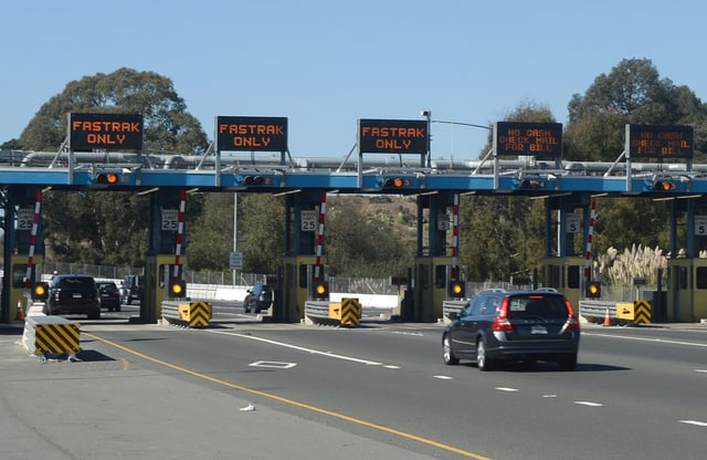 Cars roll through the toll plaza of the Richmond-San Rafael Bridge in Richmond on Thursday, Oct. 15, 2020. (Alan Dep/Marin Independent Journal)