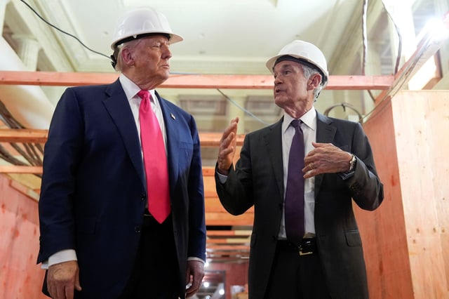 U.S. President Donald Trump and Federal Reserve Chair Jerome Powell speak during a tour of the Federal Reserve Board building, which is currently undergoing renovations, in Washington, D.C., U.S., July 24, 2025. REUTERS/Kent Nishimura/File Photo