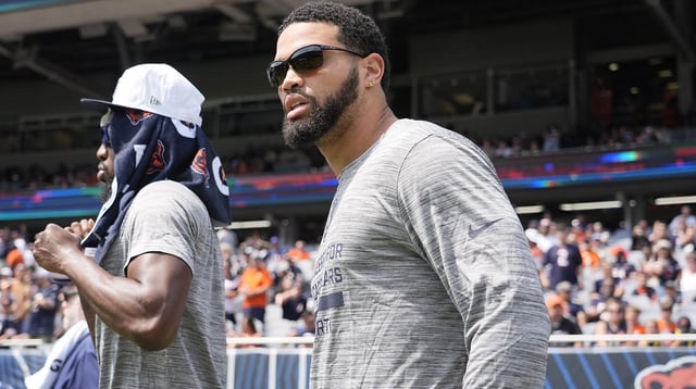 Aug 10, 2025; Chicago, Illinois, USA; Chicago Bears quarterback Caleb Williams (18) takes the field against the Miami Dolphins at Soldier Field. Mandatory Credit: David Banks-Imagn Images
