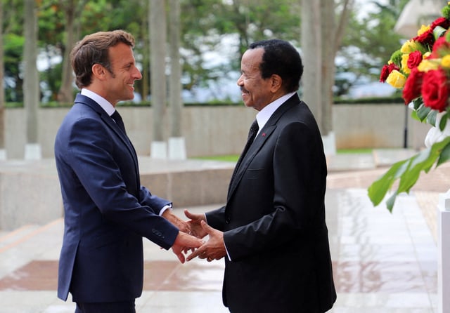 Cameroon's President Paul Biya welcomes his French counterpart Emmanuel Macron at the presidential palace in Yaounde, Cameroon, July 26, 2022. REUTERS/Desire Danga Essigue/File photo