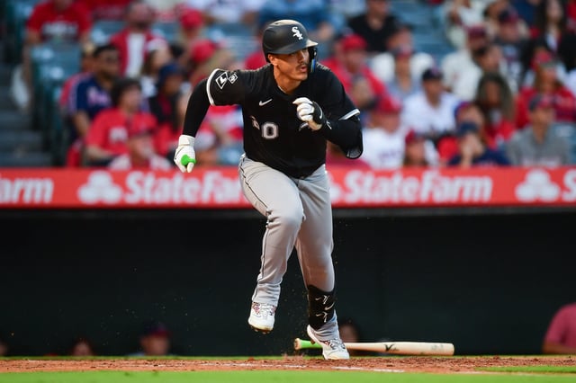 Aug 1, 2025; Anaheim, California, USA; Chicago White Sox first baseman Miguel Vargas (20) hits a single against the Los Angeles Angels during the fourth inning at Angel Stadium. Mandatory Credit: Gary A. Vasquez-Imagn Images/File Photo