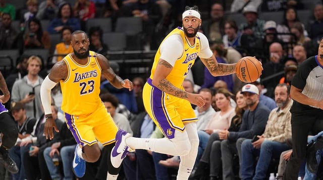 Dec 19, 2024; Sacramento, California, USA; Los Angeles Lakers forward Anthony Davis (3) dribbles the ball next to forward LeBron James (23) against the Sacramento Kings in the first quarter at the Golden 1 Center. Mandatory Credit: Cary Edmondson-Imagn Images