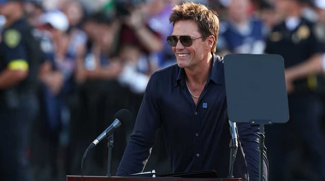 Aug 8, 2025; Foxborough, Massachusetts, USA; Retired New England Patriot Hall of Famer Tom Brady speaks during a statue unveiling before a game against the Washington Commanders at Gillette Stadium