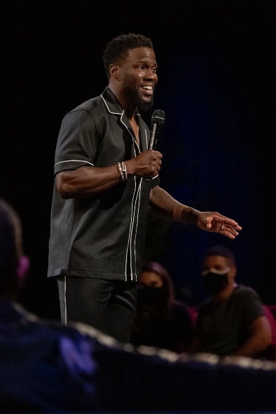 A person with a gold microphone