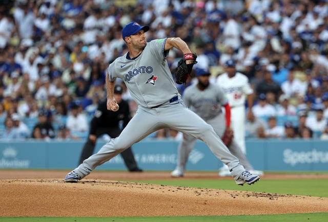 LOS ANGELES, CALIFORNIA - AUGUST 8: Starting pitcher Max Scherzer #31 of the Toronto Blue Jays throws agains the Los Angeles Dodgers during the first inning at Dodger Stadium on August 8, 2025 in Los Angeles, California.