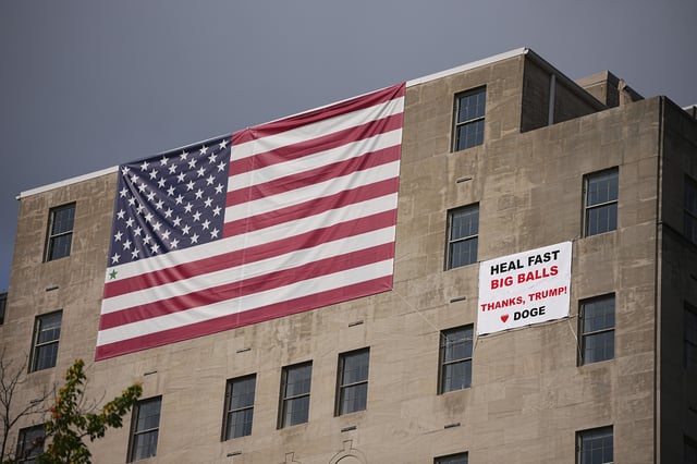 A sign wishes a speedy recovery for former DOGE appointee Edward Coristine, known by his nickname &#39;Big Balls&#39; after he was attacked in carjacking attempt, on the National Grange Building near the White House in Washington D.C., on Thursday August 7, 2025.