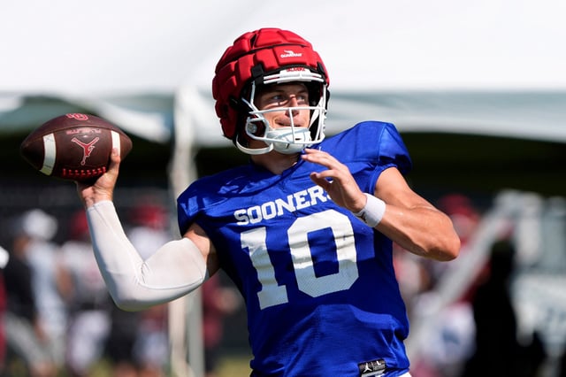 Oklahoma quarterback John Mateer throws a pass during practice in Norman, Okla., on Aug., 6, 2025.