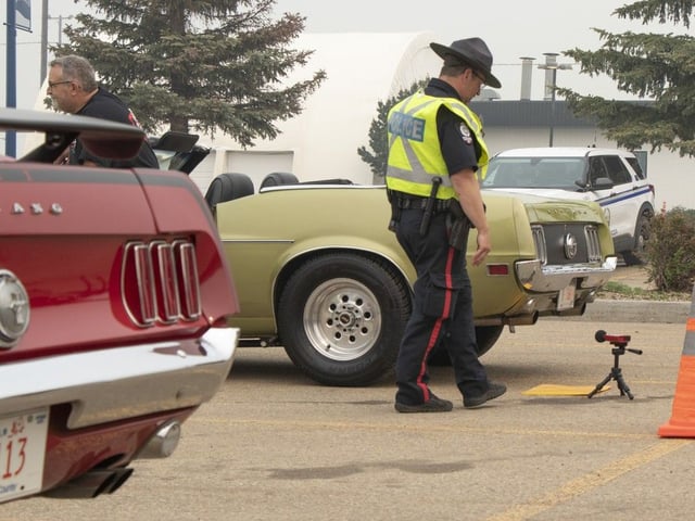 Edmonton police and peace officers test vehicle exhaust noise at the NAIT Souch Campus on May 20, 2023. This was an amnesty event so drivers could learn more about the modifications to their cars, trucks and motorcycles and how they measure up to bylaw enforcement standards.