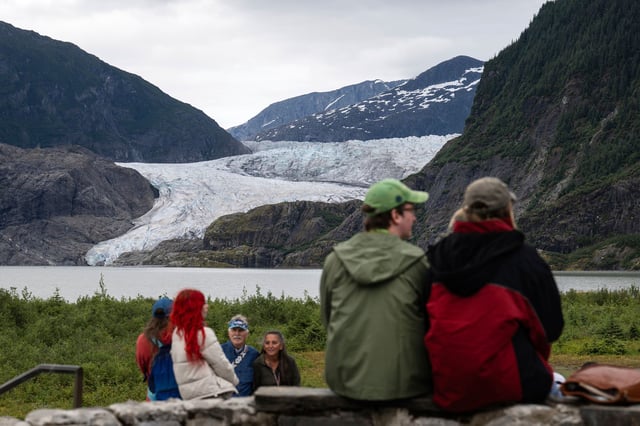 People view Mendenhall Glacier from the Mendenhall Glacier Visitors Center area, Sunday, Aug. 3, 2025, in Juneau, Alaska. (Marc Lester/Anchorage Daily News via AP)