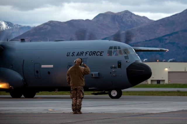 A US Air Force airman salutes at Joint Base Elmendorf–Richardson in Anchorage, Alaska, in October 2022.