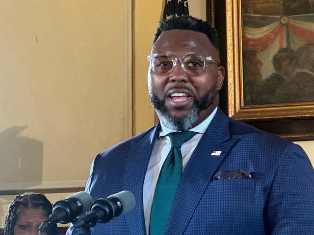Rep. Kam Buckner, D-Chicago, talks to reporters at the state Capitol, Tuesday, Aug. 12, 2025, in Springfield, Ili. (John O'Connor/AP)