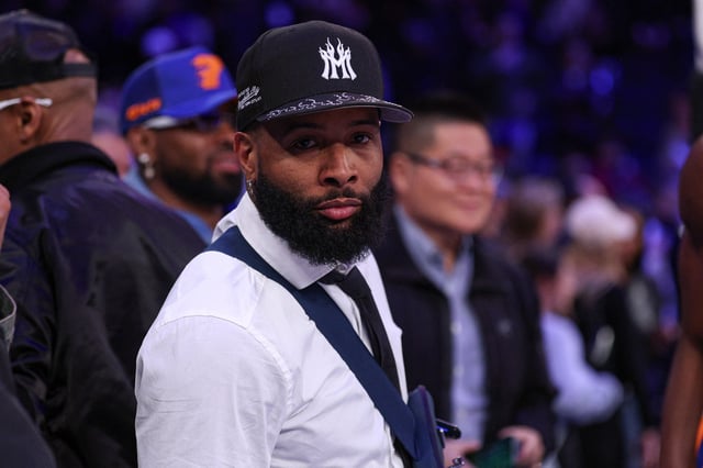 Apr 6, 2025; New York, New York, USA; NFL wide receiver Odell Beckham Jr. sits courtside during the second half of the NBA game between the New York Knicks and the Phoenix Suns at Madison Square Garden. Mandatory Credit: Vincent Carchietta-Imagn Images