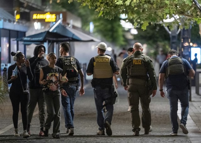 Federal agents patrol the streets of the US capital Washington after President Donald Trump announced a takeover of the city's police force