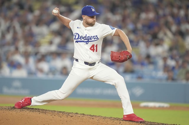 Aug 4, 2025; Los Angeles, California, USA; Los Angeles Dodgers pitcher Brock Stewart (41) delivers a pitch in the top of the ninth inning during an MLB game against the St. Louis Cardinals at Dodger Stadium. Mandatory Credit: Kirby Lee-Imagn Images
