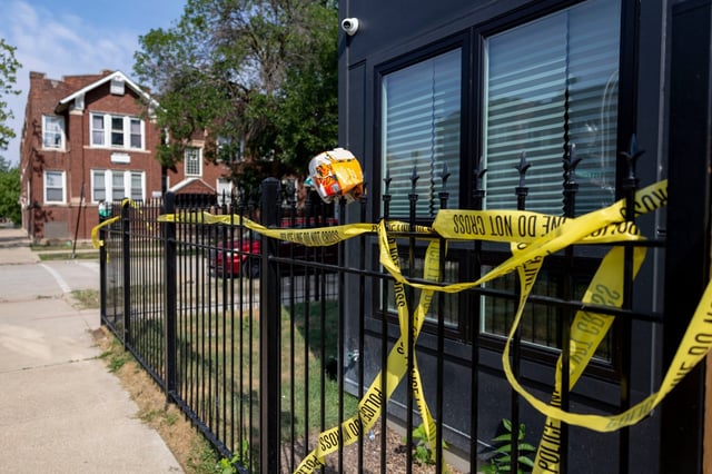 Police tape and other debris remain at the scene of an early morning shooting on Aug. 10, 2025, that injured six people, one fatally, during a large party near North La Crosse and West End avenues in the Austin neighborhood of Chicago. (Brian Cassella/Chicago Tribune)