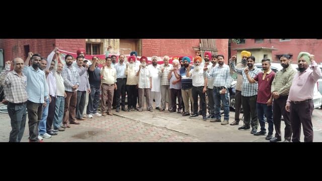 Workers during a protest at PSPCL’s CMC division in Ludhiana on Tuesday. (HT photo)