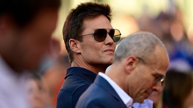 Tom Brady raised alarms regarding NIL deals, suggesting they may confuse young athletes and divert their focus from essential life values, which he believes are critical for their future success. (Photo by Billie Weiss / GETTY IMAGES NORTH AMERICA / Getty Images via AFP)