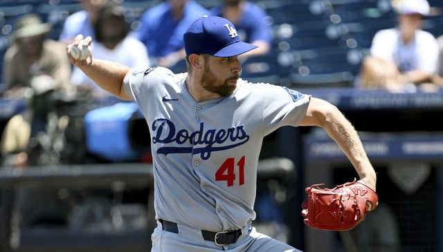 Dodgers relief pitcher Brock Stewart throws to the plate during the eighth inning of a game against the Tampa Bay Rays earlier this month in Tampa, Fla. Acquired at the trade deadline on July 31, Stewart made just four appearances for the Dodgers before landing on the injured list on Tuesday. (AP Photo/Jason Behnken)