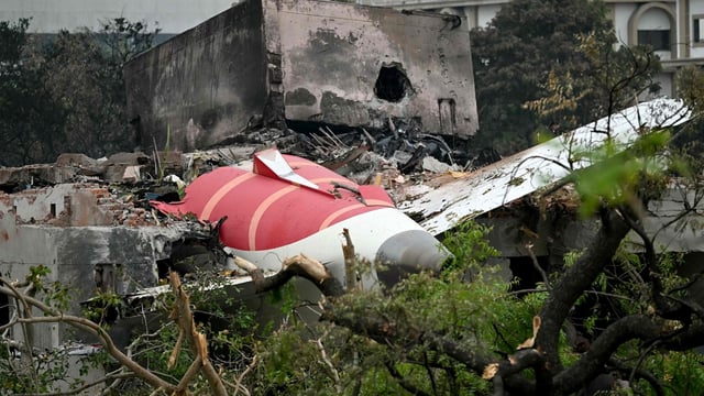 Debris of Air India flight 171 is pictured after it crashed in a residential area near the airport in Ahmedabad.