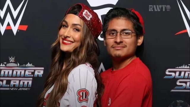 Nikki Bella, with a fan, Brian Lema
