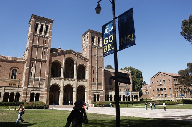 People walk on the plaza outside Royce Hall, the site of 2024 pro-Palestinian protests, on the UCLA campus on July 30, 2025 in Los Angeles, California.
