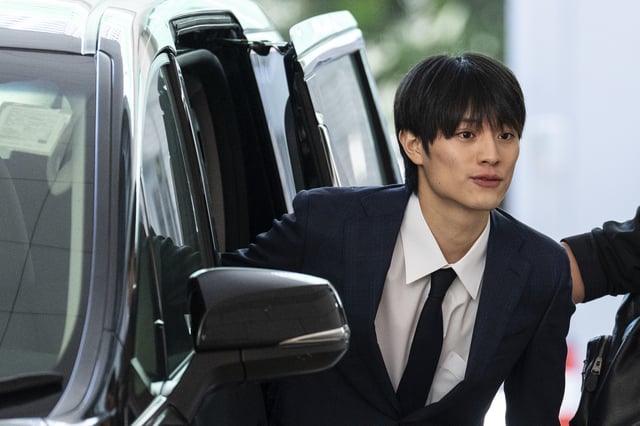 J-pop star Kenshin Kamimura arrives at the West Kowloon Magistrates' Courts to hear verdict over his indecent assault case in Hong Kong, Wednesday, August 13, 2025. (AP Photo/Chan Long Hei)