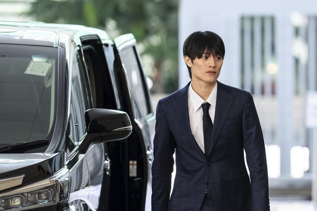 J-pop star Kenshin Kamimura arrives at the West Kowloon Magistrates' Courts to hear verdict over his indecent assault case in Hong Kong, Wednesday, August 13, 2025. (AP Photo/Chan Long Hei)