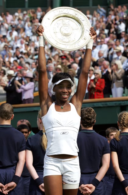 Venus Williams celebrates winning the ladies singles championship at the 2007 Wimbledon Championships at the All England Tennis Club.