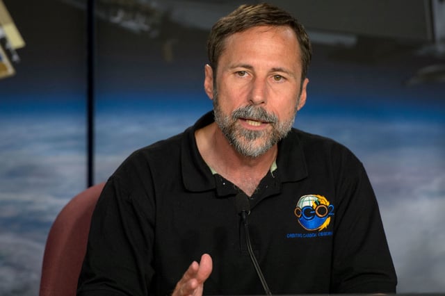 Dave Crisp speaks during an Orbiting Carbon Observatory-2 briefing in June 2014.