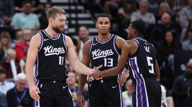 Oct 15, 2024; Salt Lake City, Utah, USA; Sacramento Kings forward Domantas Sabonis (11), forward Keegan Murray (13) and guard De&#39;Aaron Fox (5) react to a play against the Utah Jazz during the second quarter at Delta Center. Mandatory Credit: Rob Gray-Imagn Images