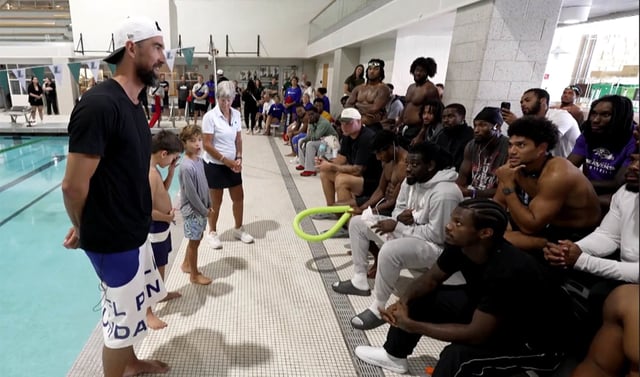 Michael Phelps teaches Ravens how to swim.