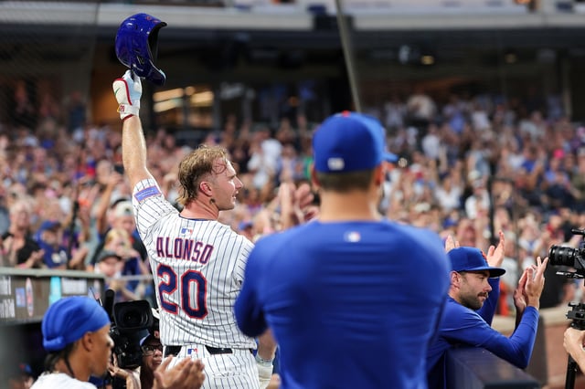 NEW YORK, NEW YORK - AUGUST 12: Pete Alonso #20 of the New York Mets gestures to the crowd after hitting a two-run home run during the third inning at Citi Field on August 12, 2025 in New York City. Alonso&#39;s 253rd home run is a New York Mets franchise record