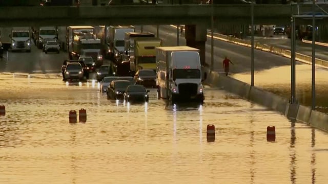 Chattanooga flooding: Traffic moves through a flooded road in Chattanooga, Tenn., Tuesday, Aug. 12, 2025. (WTVC via AP) 