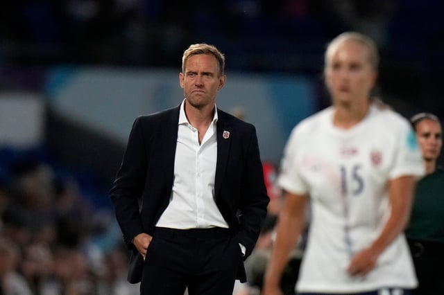 Norway coach Martin Sjögren stands by the touchline during a Euro 2022 Group A match against Austria in Brighton, England. (AP Photo/Alessandra Tarantino)