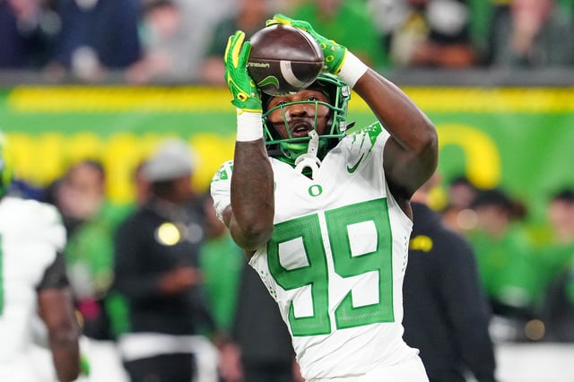 Dec 1, 2023; Las Vegas, NV, USA; Oregon Ducks wide receiver Jurrion Dickey (99) warms up before a game against the Washington Huskies at Allegiant Stadium. Mandatory Credit: Stephen R. Sylvanie-USA TODAY Sports/File Photo