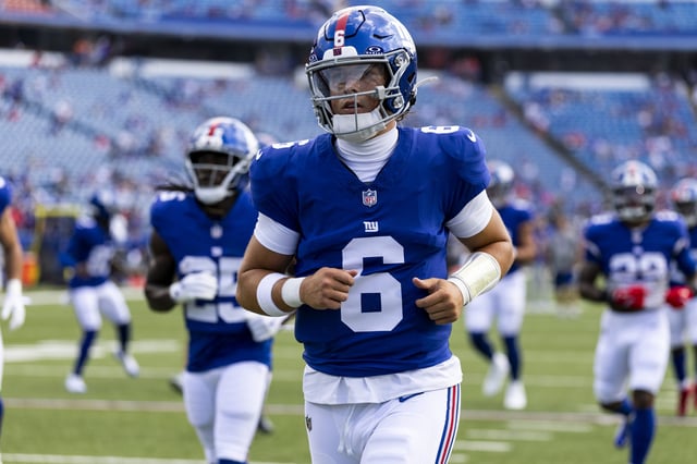 Jaxson Dart #6 warms up before a NFL Preseason 2025 game against the Buffalo Bills at Highmark Stadium on August 9, 2025 in Orchard Park, New York.