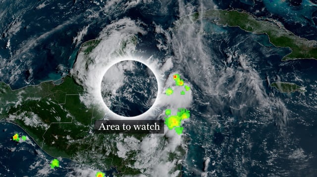 In this weather satellite photo of Mexico&#39;s Yucatán Peninsula taken Wednesday morning, a label has been superimposed to show where a tropical wave of low atmospheric pressure is producing thunderstorms in the western Caribbean Sea. This wave is expected to enter the Bay of Campeche in the southern Gulf of Mexico and send tropical downpours to Central and South Texas by the weekend.