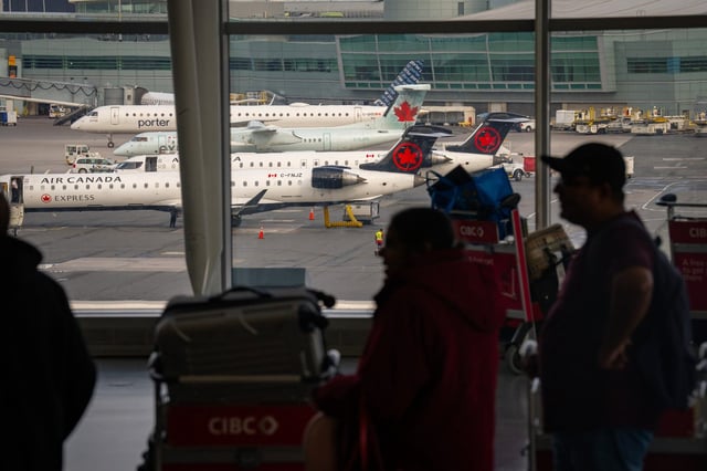 The Air Canada check-in area inside Terminal 1 of Toronto Pearson International Airport is pictured in Mississauga, Ont., on Wednesday, August 13 2025. THE CANADIAN PRESS/Arlyn McAdorey