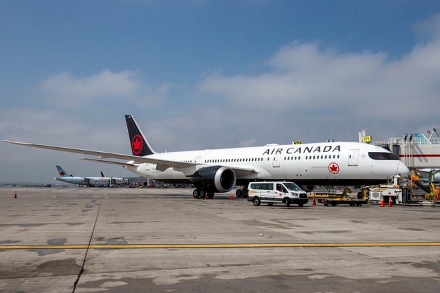 An Air Canada plane is parked at Toronto Pearson Airport in Mississauga, Ontario, Canada April 28, 2021. REUTERS/Carlos Osorio