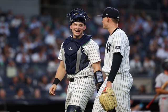 NEW YORK, NY - AUGUST 11: Ben Rice #22 talks to Will Warren #98 of the New York Yankees during the game against the Minnesota Twins at Yankee Stadium on August 11, 2025 in New York, New York. (Photo by New York Yankees/Getty Images)