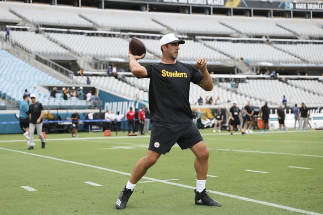 Aaron Rodgers #8 of the Pittsburgh Steelers warms up prior to a NFL Preseason 2025 game against the Jacksonville Jaguars at Everbank Stadium on August 9, 2025 in Jacksonville, Florida.