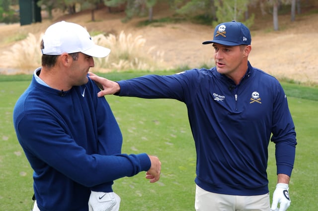 LAS VEGAS, NEVADA - DECEMBER 16: Bryson DeChambeau (R) of LIV Golf and Scottie Scheffler of the PGA Tour talk before The Showdown: McIlroy and Scheffler v DeChambeau and Koepka at Shadow Creek Golf Course on December 16, 2024 in Las Vegas, Nevada. (Photo by Kevin C. Cox/Getty Images for The Showdown)