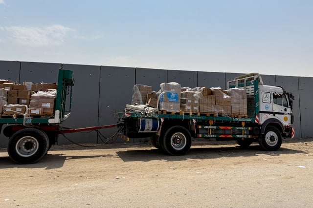 A truck carrying humanitarian aid from the World Health Organization stands near the Rafah border crossing between Egypt and the Gaza Strip, in Rafah, Egypt, August 11, 2025. REUTERS/Alexander Dziadosz/File Photo